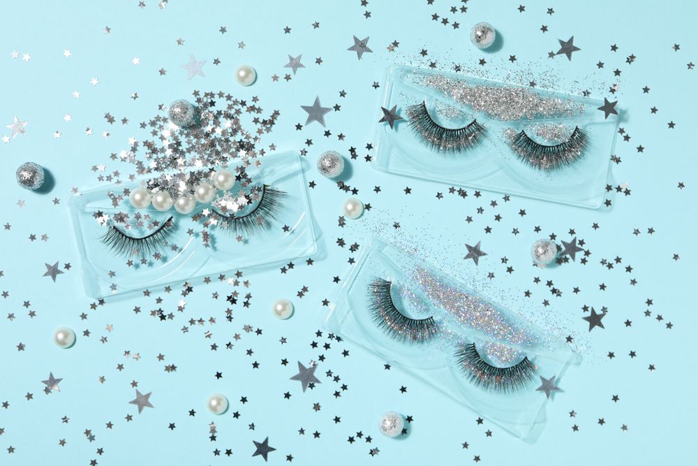 concept of cosmetology tools and beauty treatment, false eyelashes