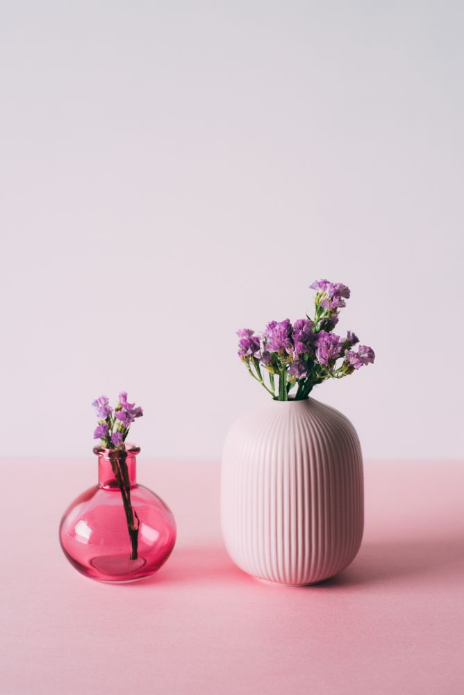 Violet sea lavender flowers in a pink