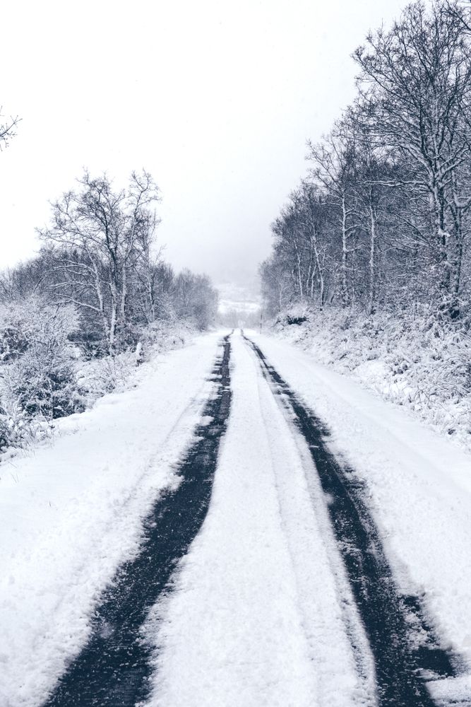Winter snowy empty country road