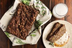 Crispy appetizing cake on plate on wooden surface