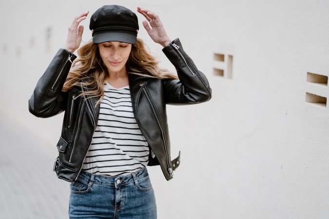 Stylish confident woman walking on the street
