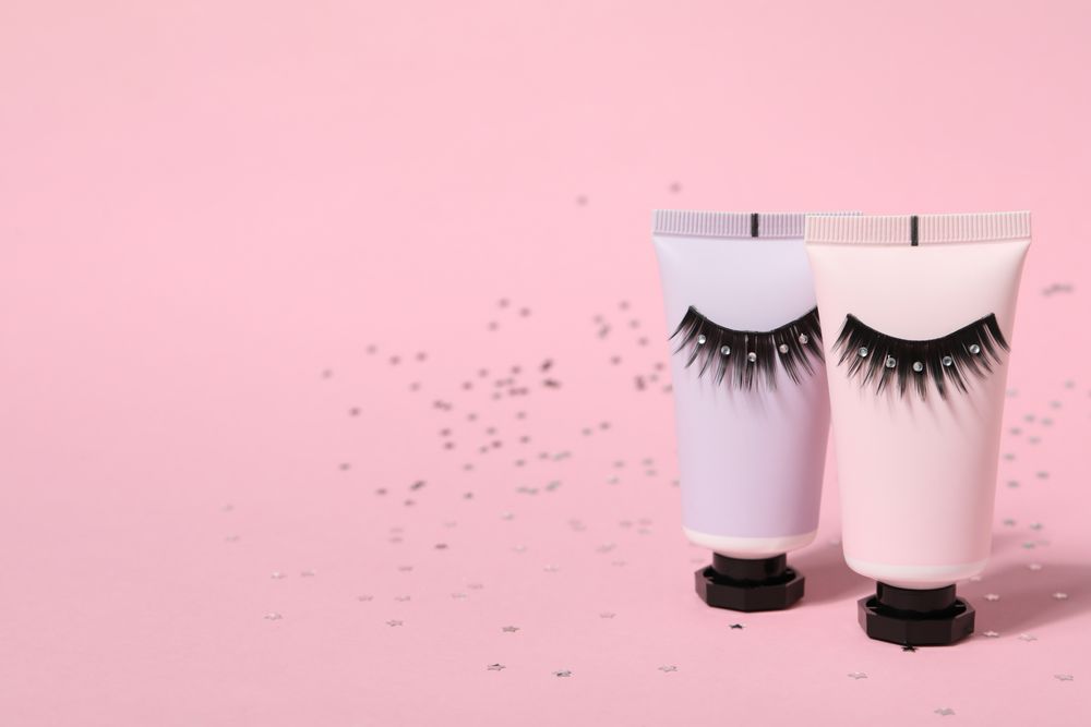 concept of cosmetology tools and beauty treatment, false eyelashes