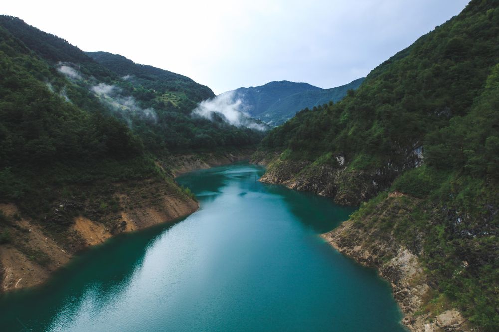 Blue river within mountain