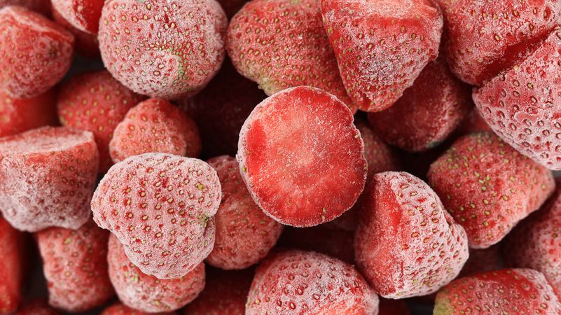 Frozen strawberries with frost