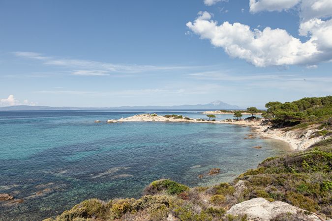 Breathtaking scenery of crystal water and bright cloudy sky
