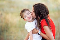 Affectionate mom with son outdoor