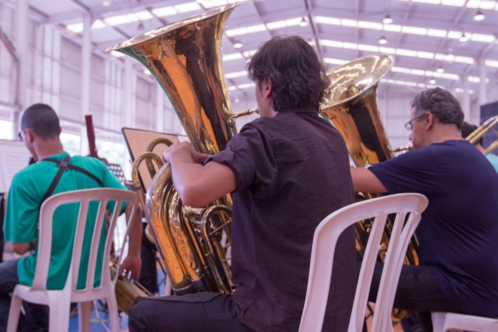 Group of people playing tuba