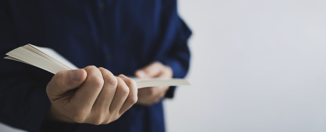 Man Reading Book Close-Up