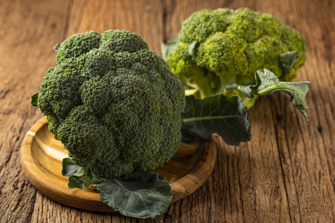 Green organic broccoli on the table.