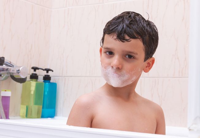 Kid taking a bath