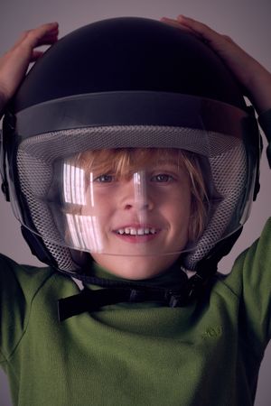 Smiling boy in safety helmet