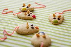 Cookies with mouse shaped and red licorice tail