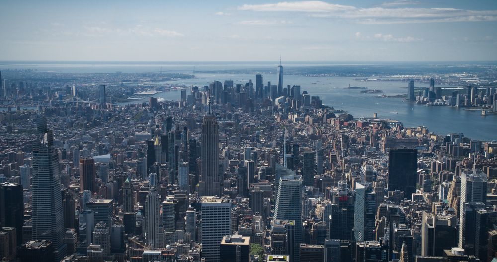 Scenic Aerial New York City View Towards Lower Manhattan Architecture. Panoramic Footage of Midtown Financial District from a Helicopter. Cityscape with Office Buildings and Skyscrapers