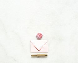 Flat lay envelope, pen and Meringue kiss