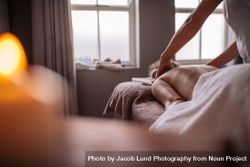 Woman having relaxing body massage in spa salon 4MGNxy