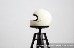 Side shot of motorcycle helmet on a stool 5roep4