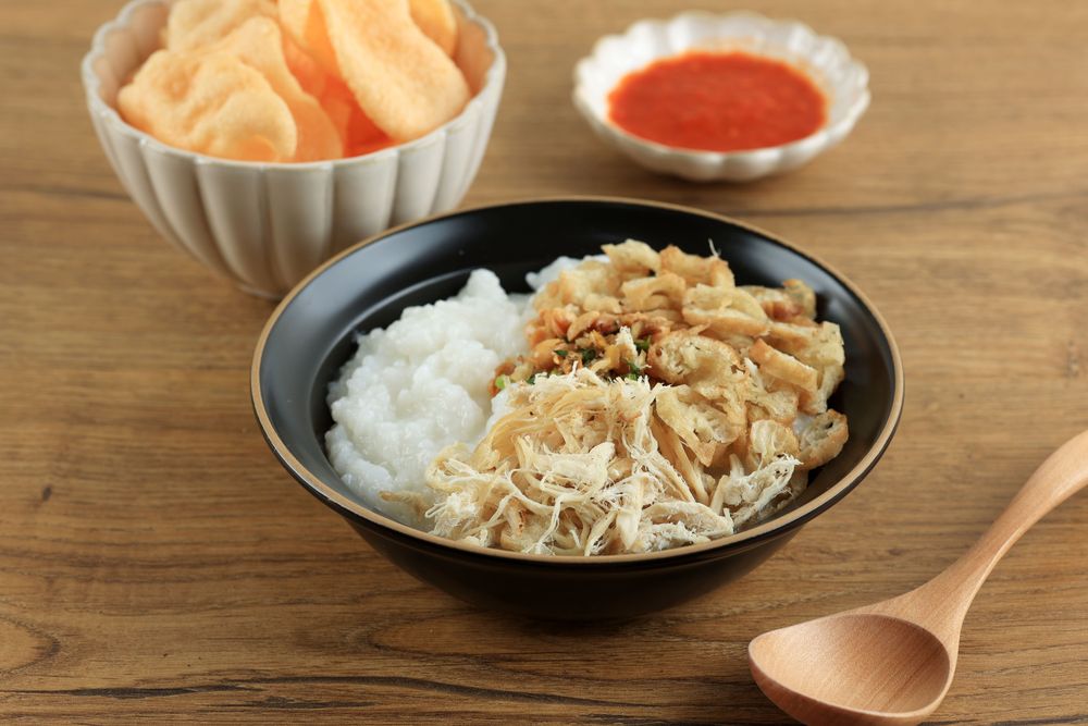 Bubur Ayam or Indonesian Rice Porridge with Shredded Chicken.
