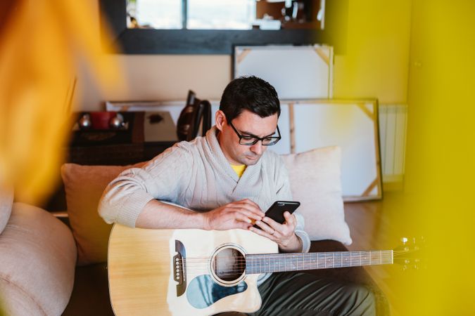Musician looking at the mobile