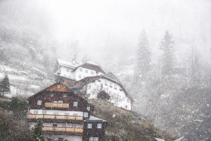 Dense snowfall over mountain village