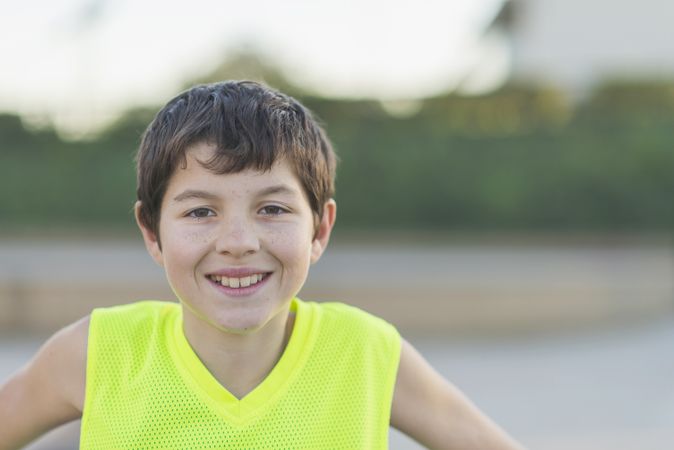 Portrait of casually dressed male teen outdoors