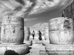 Grayscale photo of two women at the archeological site in Luxor,Luxor Governorate,Egypt 47qq60