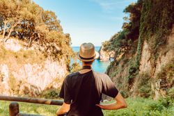 Female tourist contemplating picturesque landscape