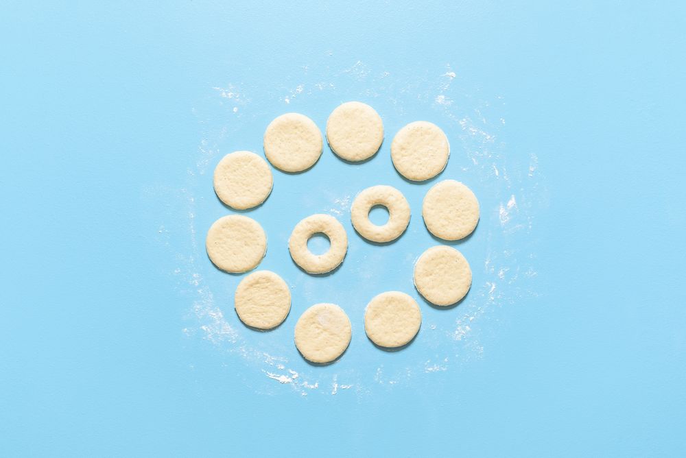 Uncooked raw dough prepared for donuts
