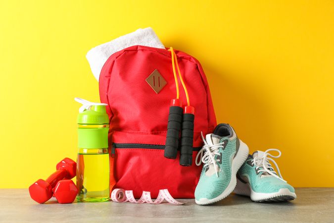 Loss weight accessories on grey table against color background