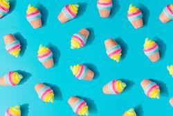 Colorful ice cream pattern on bright blue background