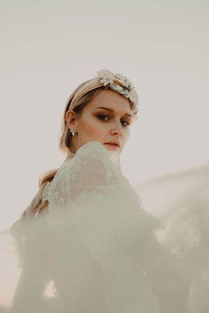 Woman in dress posing on nature