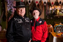 Two men in country western attire