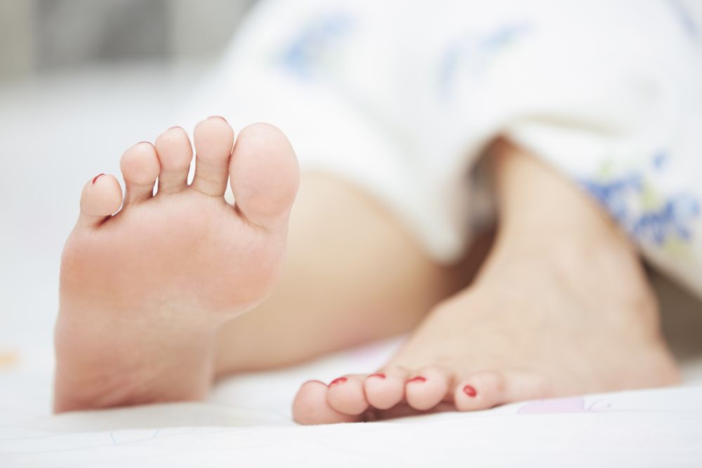Feet of sleeping woman