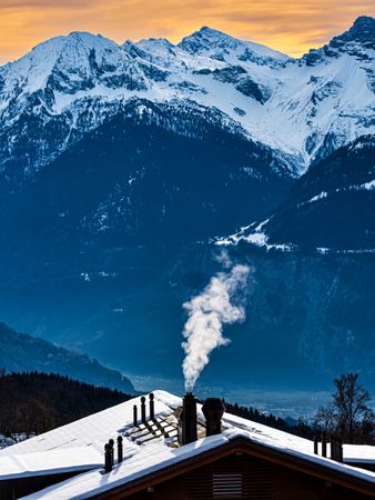 Swiss Alps winter landscape with snow and sun, mountains in Europe