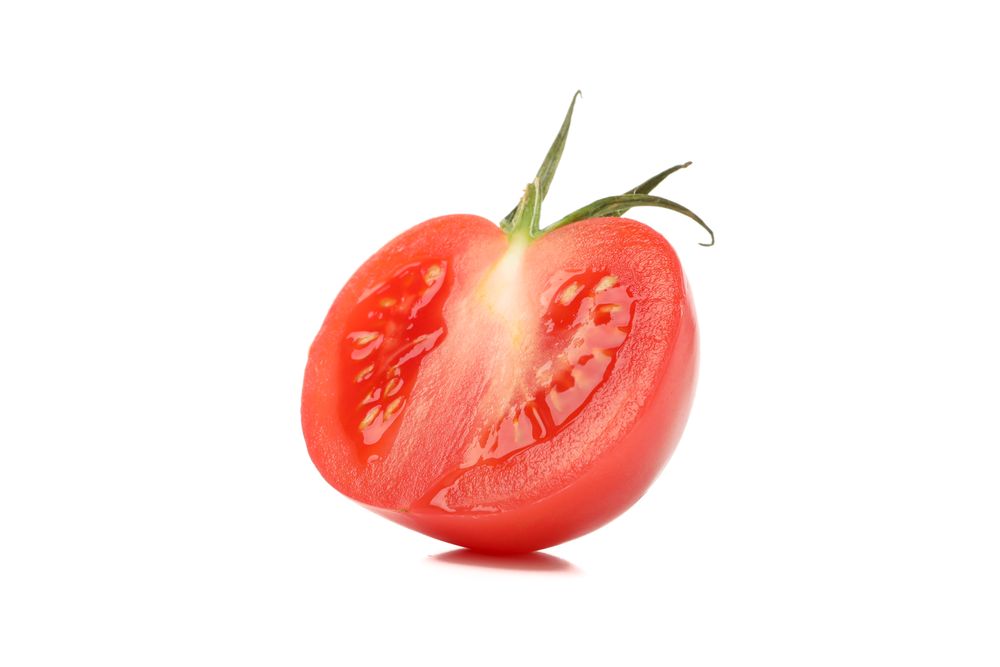Fresh ripe tomato isolated on neutral background