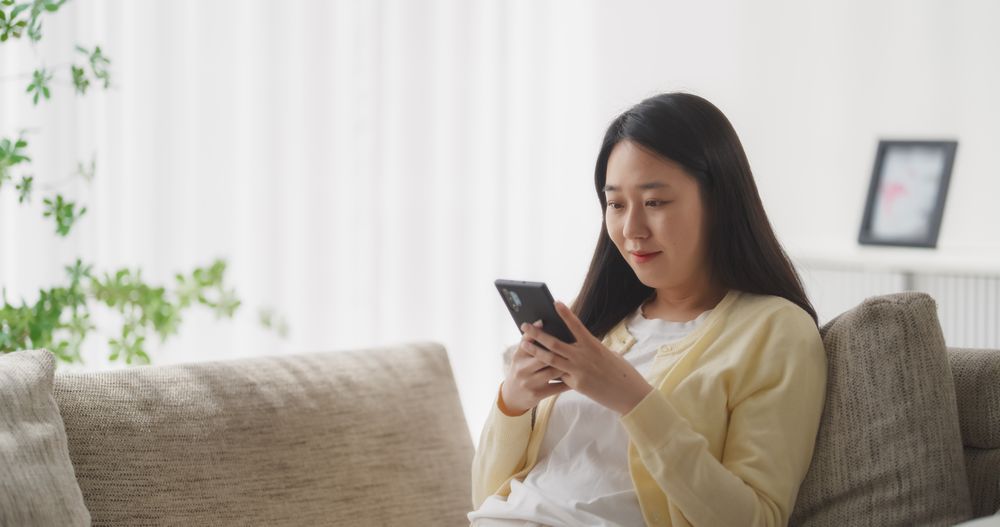 Young South Korean Woman Engaged and Connected Online