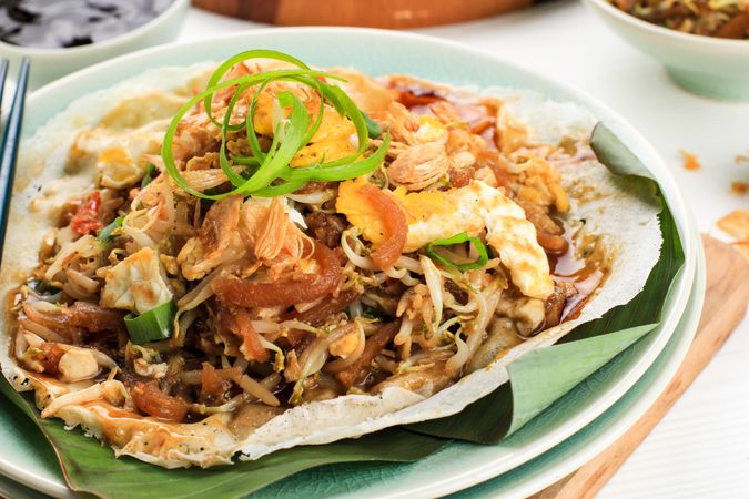 Lumpia Basah Bandung, Popular Traditional Street Food Snack Made from Thin Wrapper with Saute Spicy Soy Bean Sprout and Bamboo Sprout