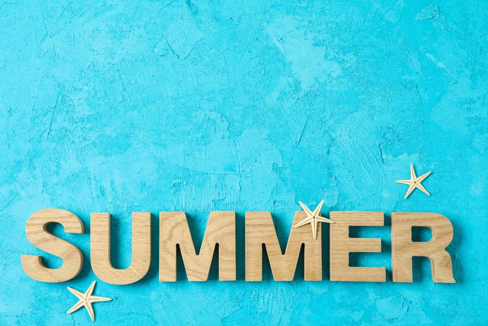 Inscription summer with starfishes on color background, space for text. Happy holidays