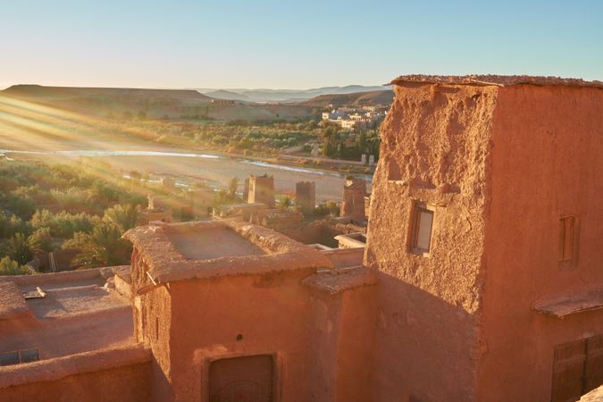 Ancient city near river in desert and wonderful sky