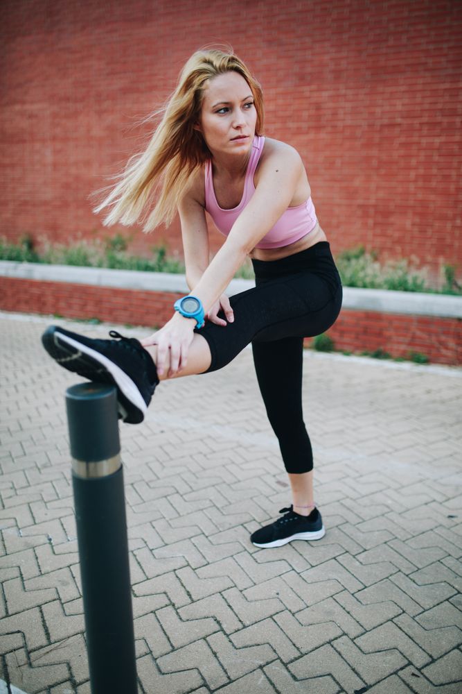 Woman stretching after running