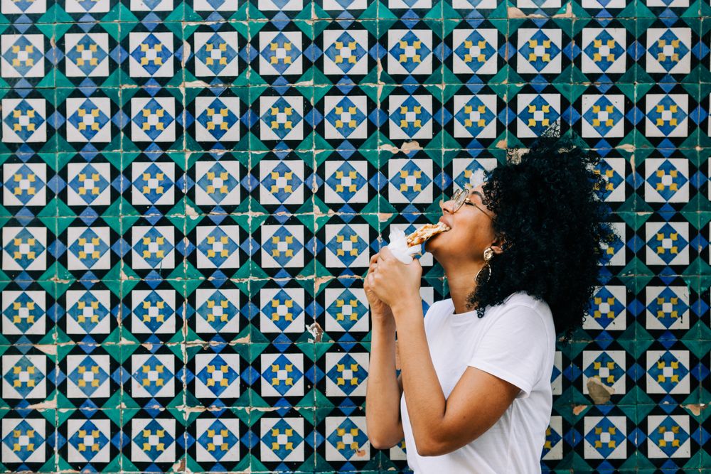 Cheerful female with tasty waffle