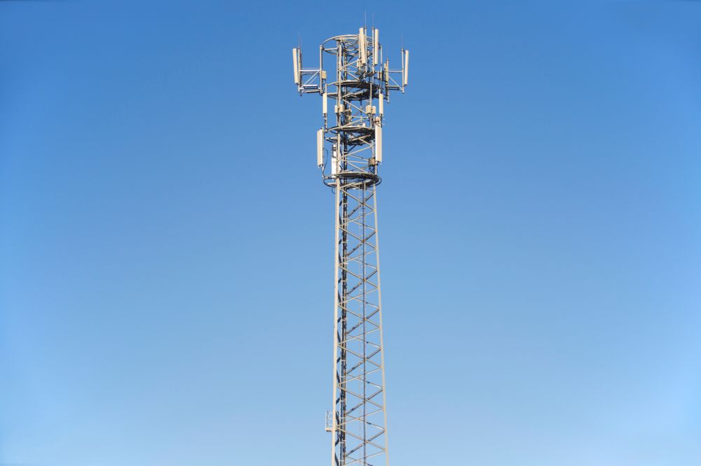 Modern Communication Tower Against a Clear Blue Sky