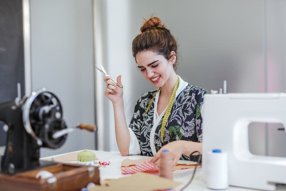 Woman in a sewing school