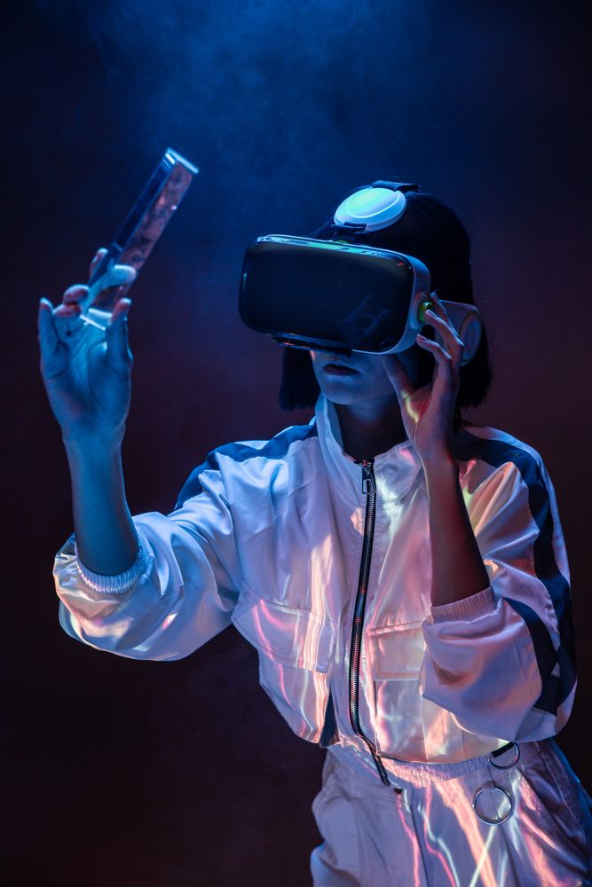 Woman touching air in VR glasses