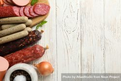 Selection of cured meats with wooden background, copy space 4dNED0