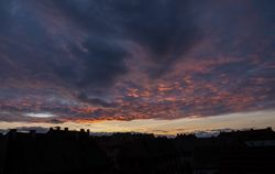 Dark clouds over the last light of sky before sunset