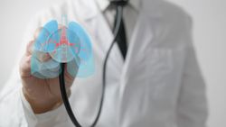 Doctor uses stethoscope with lung hologram
