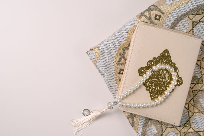 Elegant Prayer Book with Pearls and Intricate Islamic Design