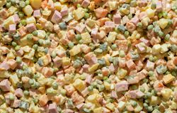 Olivier salad background full frame, above view
