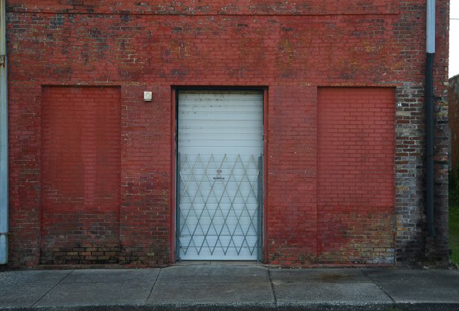 A red bricked building with a door