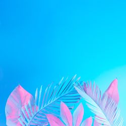 Tropical leaves in vibrant bold gradient holographic neon  colors